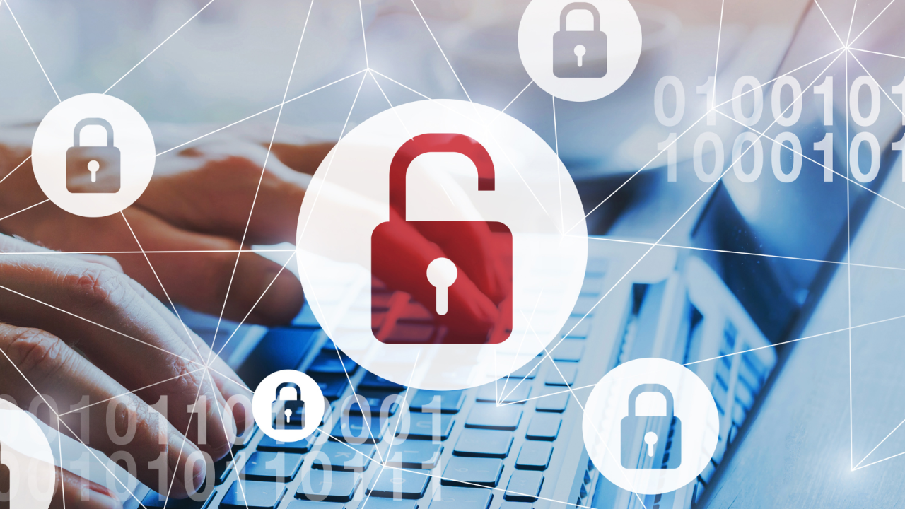 graphic showing hands typing on a computer with an overlay showing locks